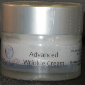 A jar of advanced wrinkle cream on top of a table.