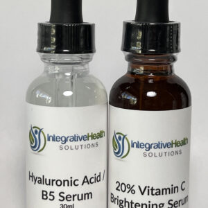 A bottle of serum and a bottle of vitamin c.